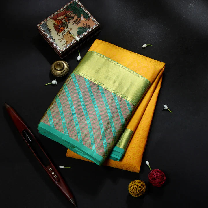 Celebrate Varamahalakshmi in Style: Best Silk Saree Colours and Motifs