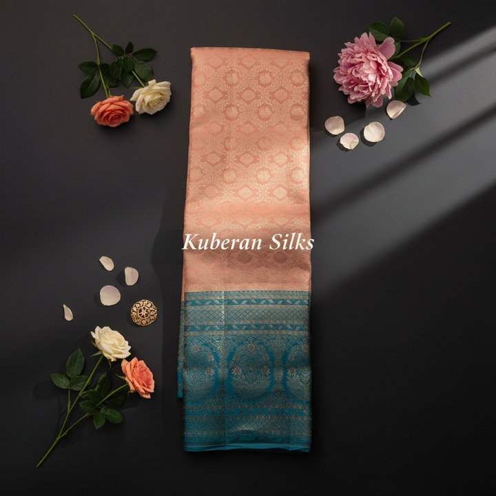 Kuberan Pink and Teal Kanchipuram Silk Saree