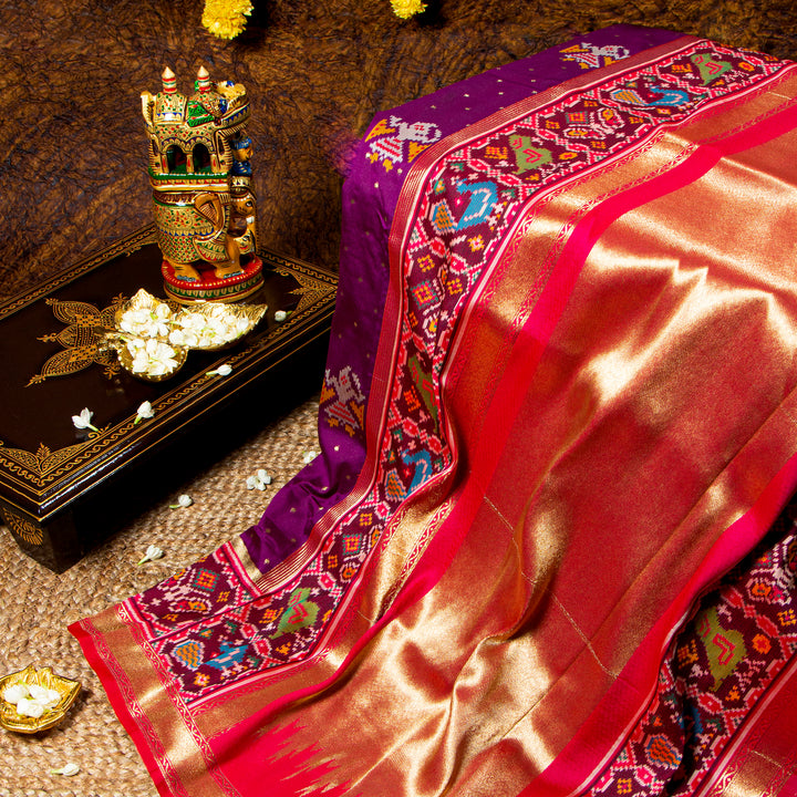 Kuberan magenta Paithani Patola saree