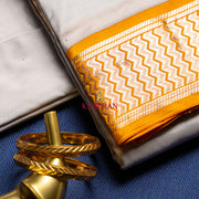 kuberan silver with orange border pure silk dhoti