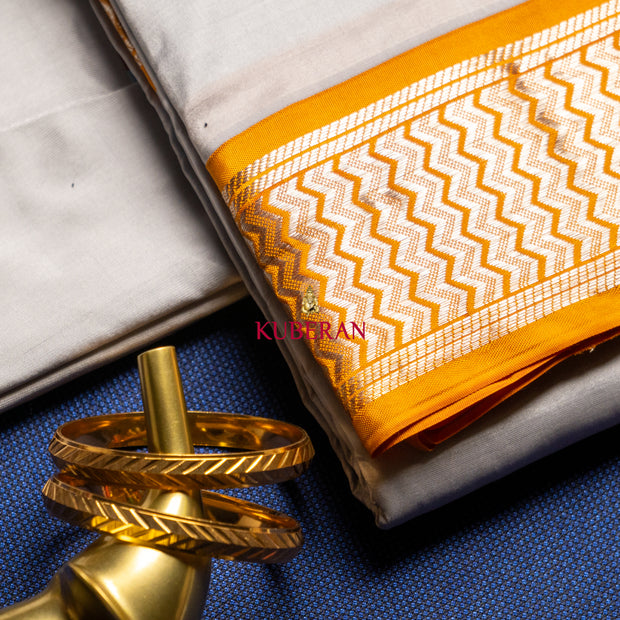 kuberan silver with orange border pure silk dhoti