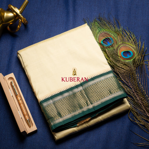 kuberan cream with green border pure silk dhoti