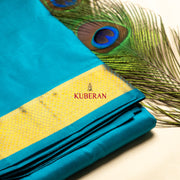 kuberan blue with golden border pure silk border