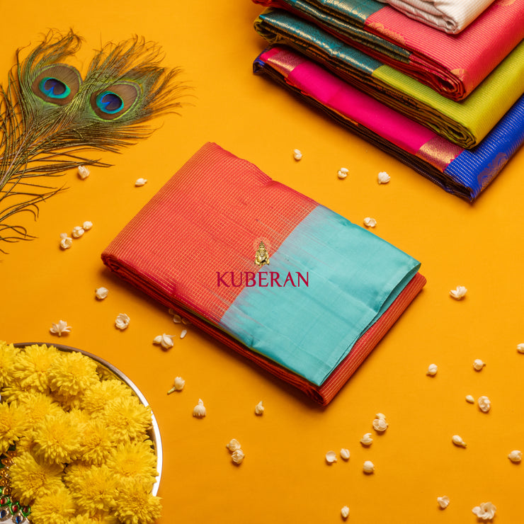 kuberan orange with blue border pure silk saree