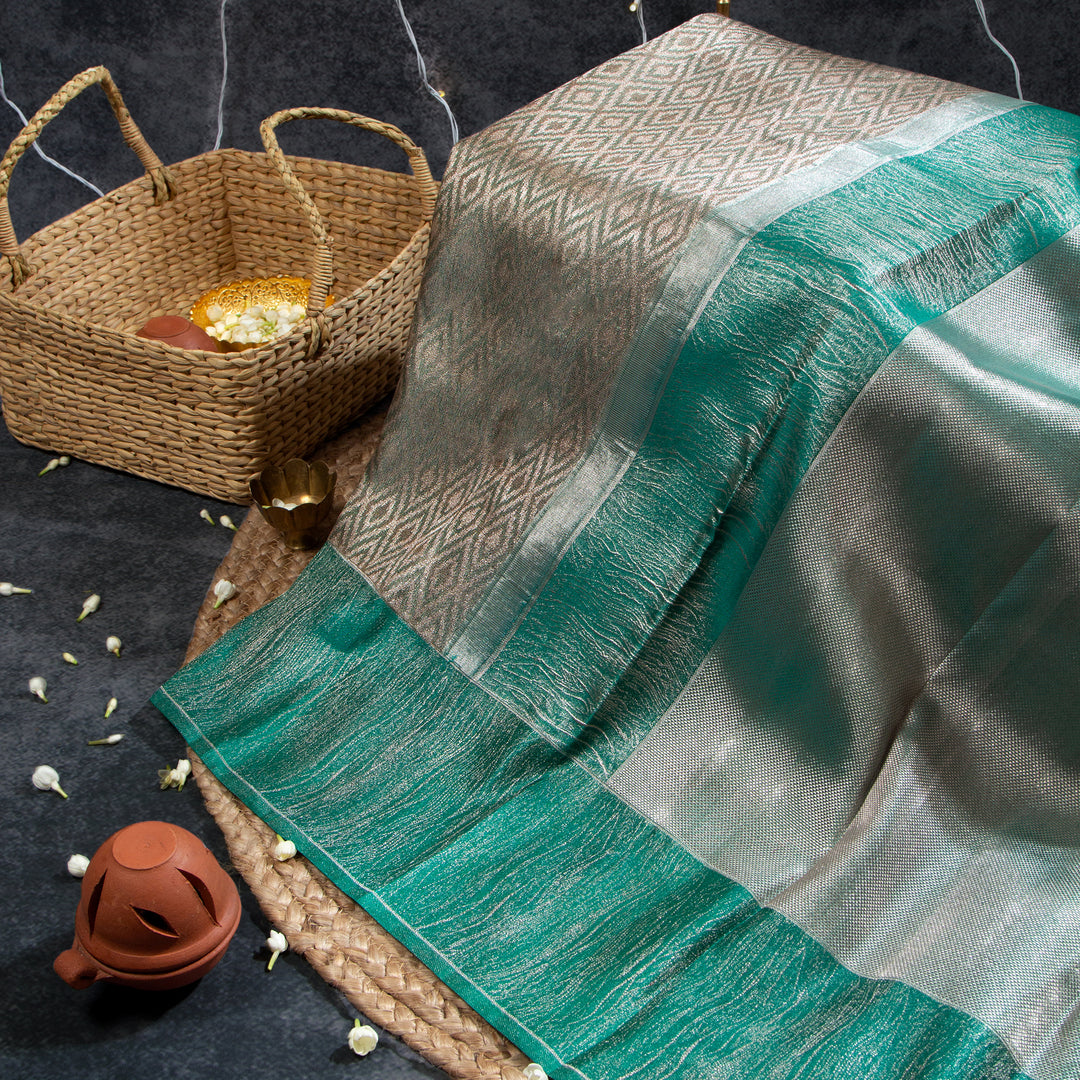 Kuberan Silver With Teal Green Kanchivaram Saree