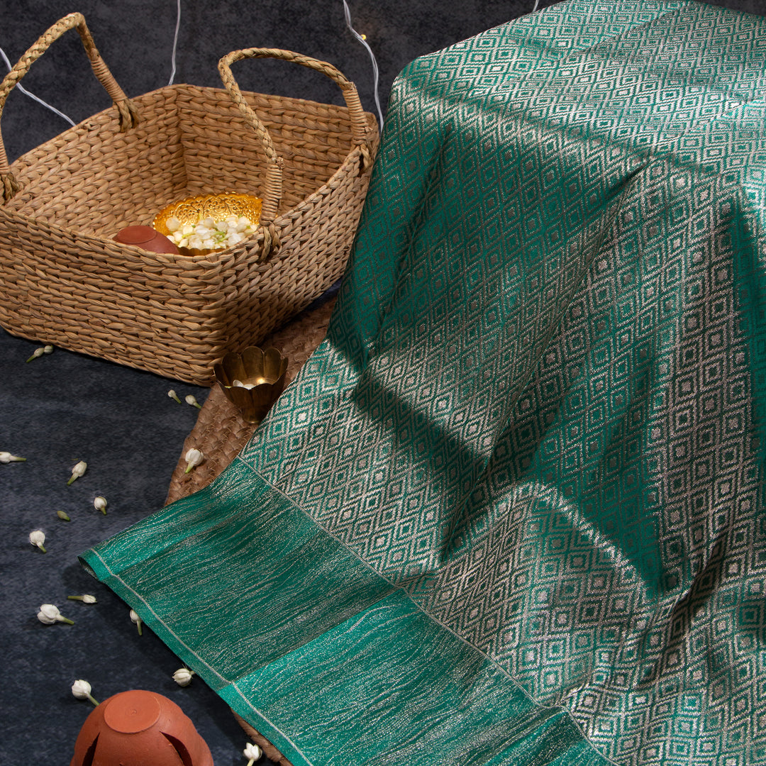 Kuberan Silver With Teal Green Kanchivaram Saree