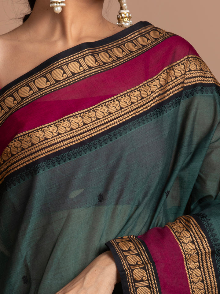 kuberan bottle green kanchi cotton sarees