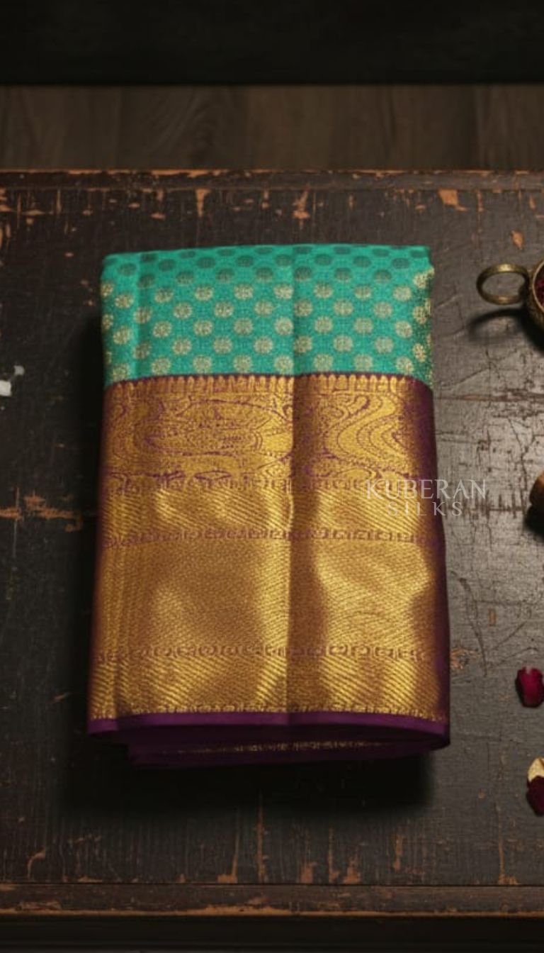 KUBERAN TEAL GREEN PURE SILK KANCHIVARAM SAREE WITH MAGENTA PURPLE BORDER