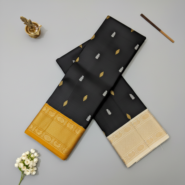 Kuberan Black Kanchipuram Silk Saree with Gold & Silver Leaf Motifs and Dual 2 Border