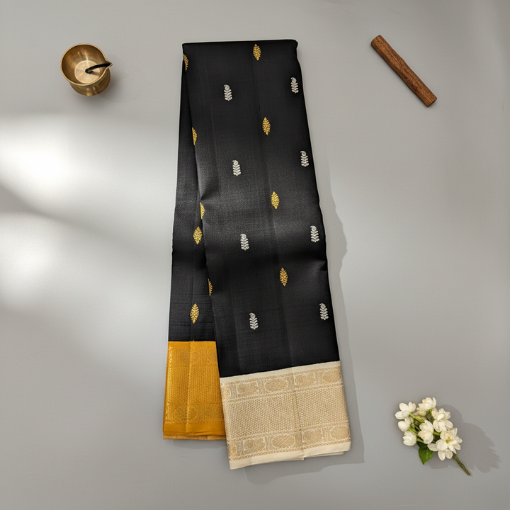 Kuberan Black Kanchipuram Silk Saree with Gold & Silver Leaf Motifs and Dual 2 Border