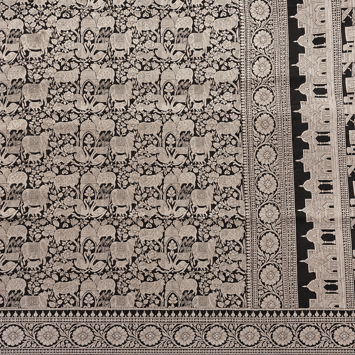 Black saree pattern close-up preview