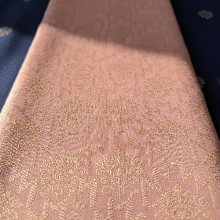 Blush pink Kanchipuram silk saree body floral zari jaal detail close-up