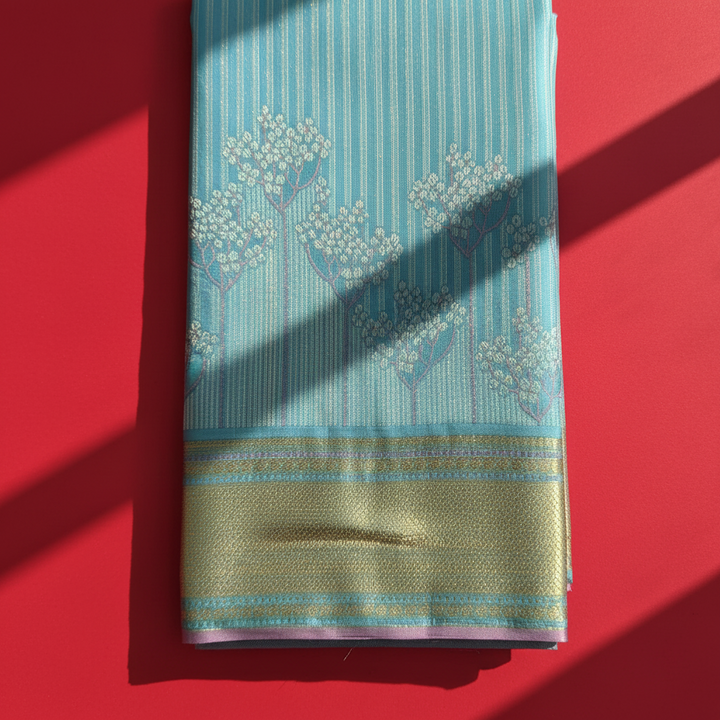 Kuberan Sky Blue with silver Floral Tree Butta & Broad Gold Zari Border Kanchipuram Silk Saree