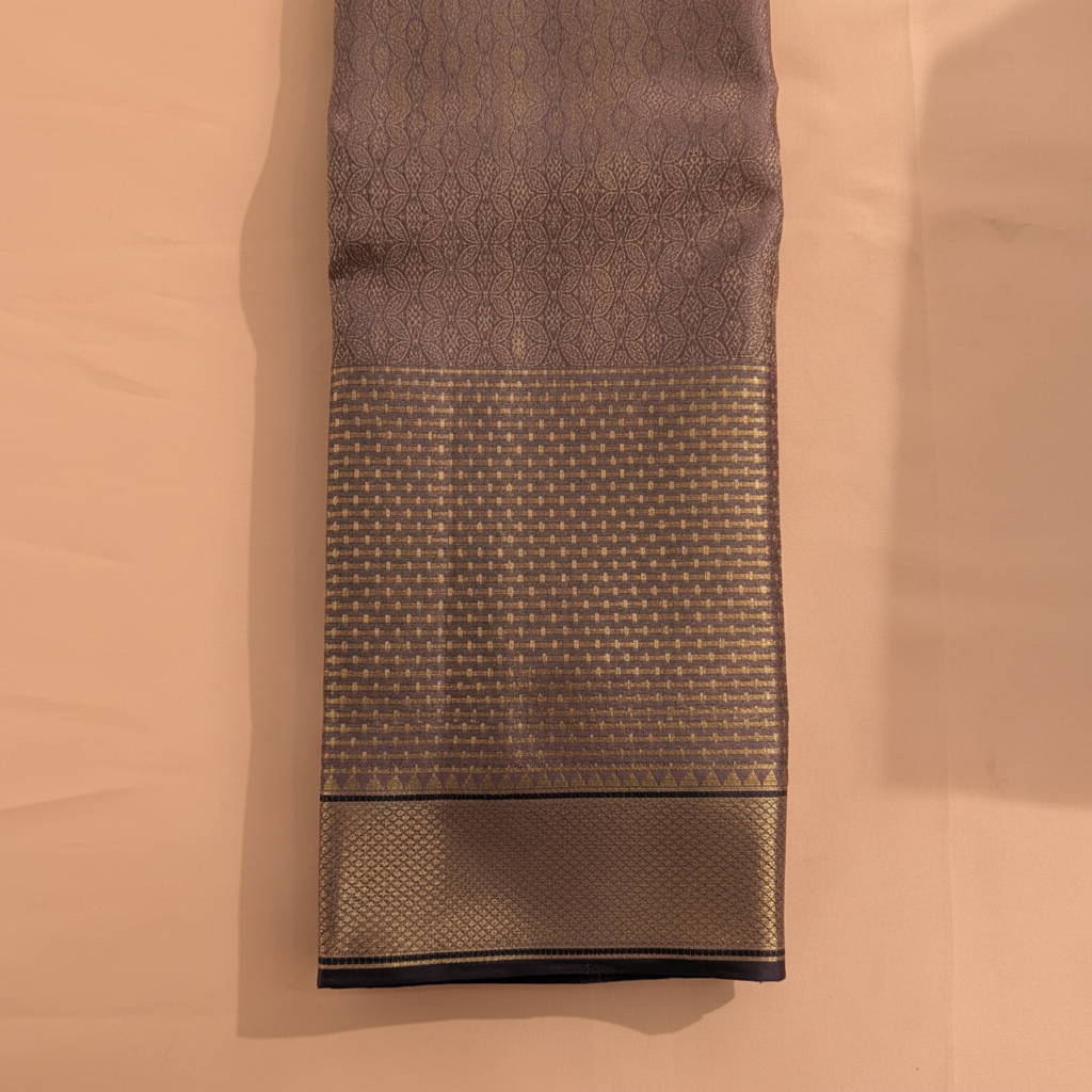 Kuberan Mauve Taupe with All-Over Gold Zari Interlocking Petal & Diamond Lattice Jaal & Broad Self-Colour Gold Zari Basket-Weave Border with Deep Navy Selvedge Kanchipuram Silk Saree