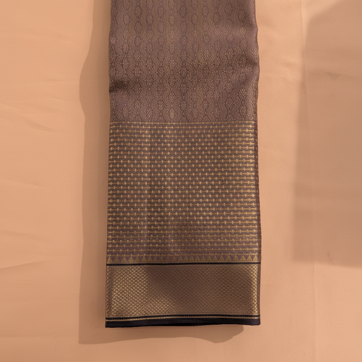 Kuberan Mauve Taupe with All-Over Gold Zari Interlocking Petal & Diamond Lattice Jaal & Broad Self-Colour Gold Zari Basket-Weave Border with Deep Navy Selvedge Kanchipuram Silk Saree