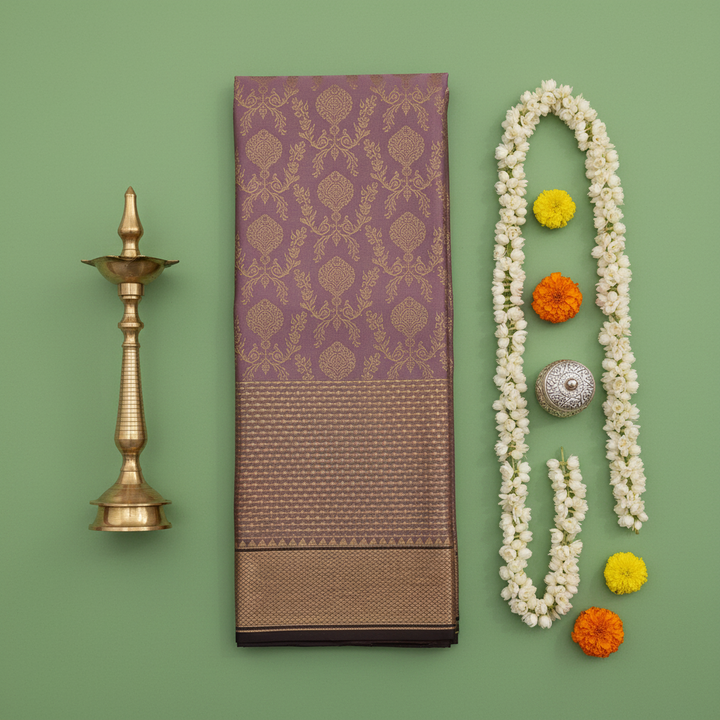 Kuberan  Mauve Lilac with All-Over Gold Zari Floral  Butta & Broad Antique Gold Zari Border Kanchipuram Silk Saree