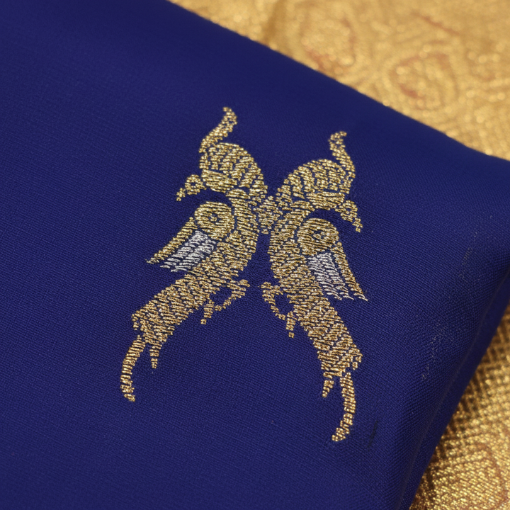 Kanchipuram Silk Saree - Royal Blue with Scattered Gold & Silver Zari Paired Parrot Buttas & Broad Crimson Red Dense Gold Zari Paisley Scroll Multi-Band Border