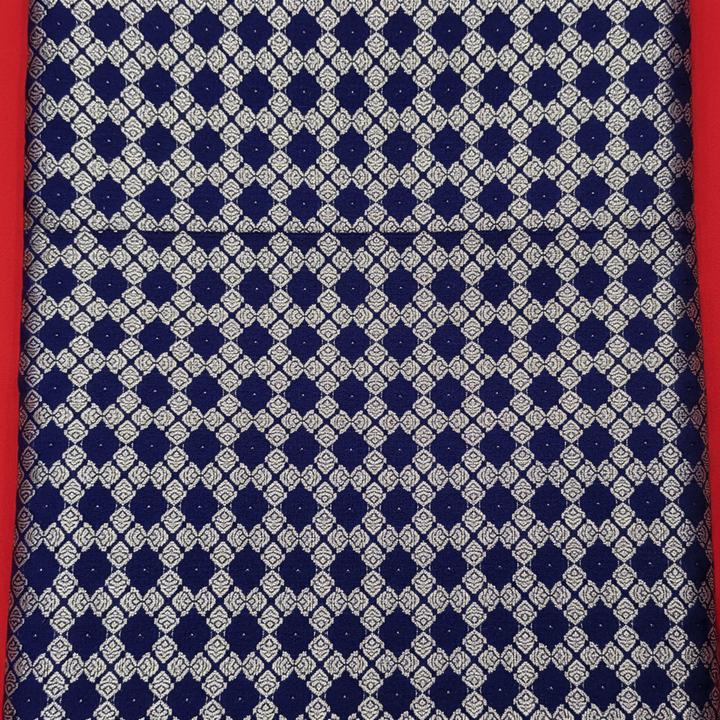 Kuberan  Midnight Navy Blue with All-Over Silver Zari Diamond & Rosette Jaal & Broad Contrast Sky Blue Gold Zari borderKanchipuram Silk Saree