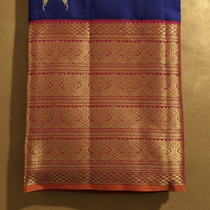 Kanchipuram Silk Saree - Royal Blue with Scattered Gold & Silver Zari Paired Parrot Buttas & Broad Crimson Red Dense Gold Zari Paisley Scroll Multi-Band Border