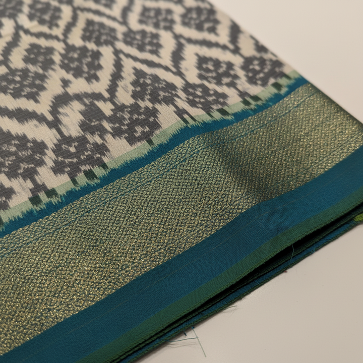 KUBERAN WHITE POCHAMPALLY SILK SAREE