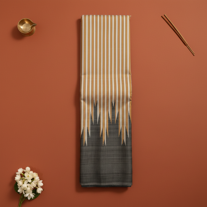 Kuberan Cream & Gold Stripe Kanchipuram Silk Saree with Dramatic Charcoal Spike Temple Border