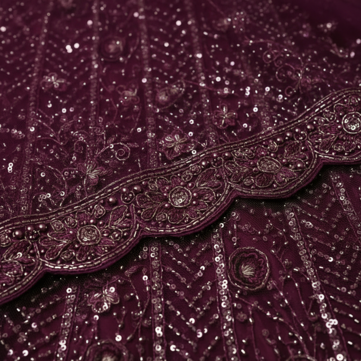 Kuberan Wine Embroidered Net Lehenga