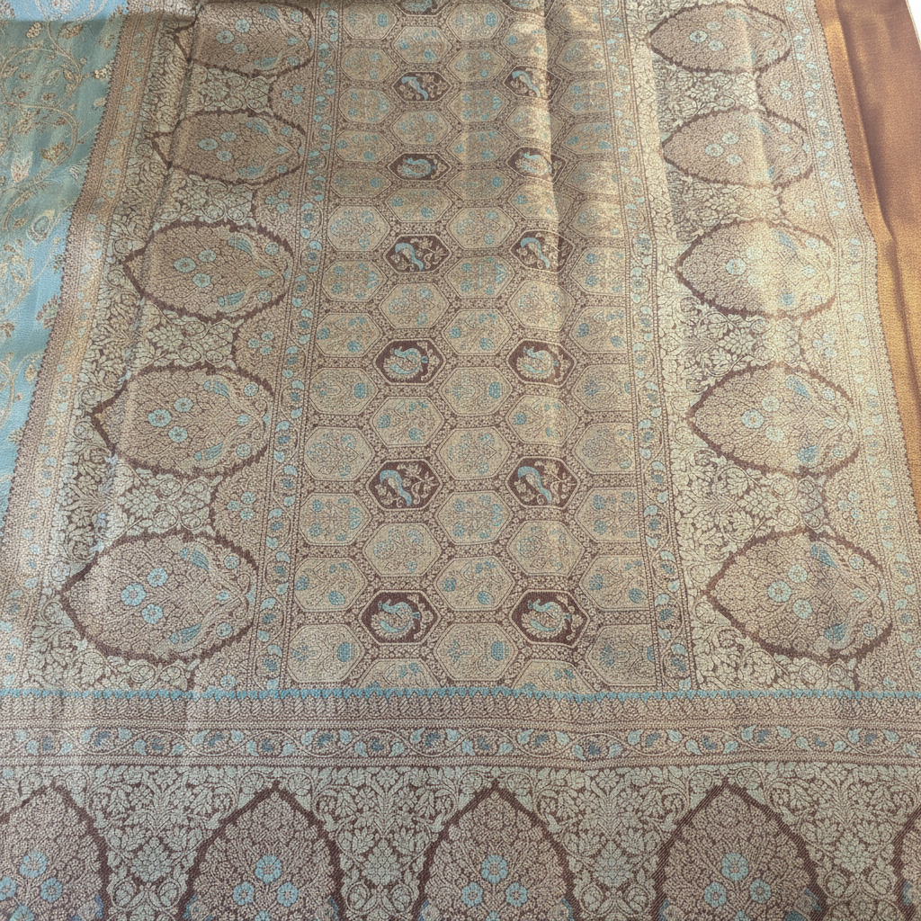 Turquoise Kanchipuram Silk Saree with Silver Peacock Motifs