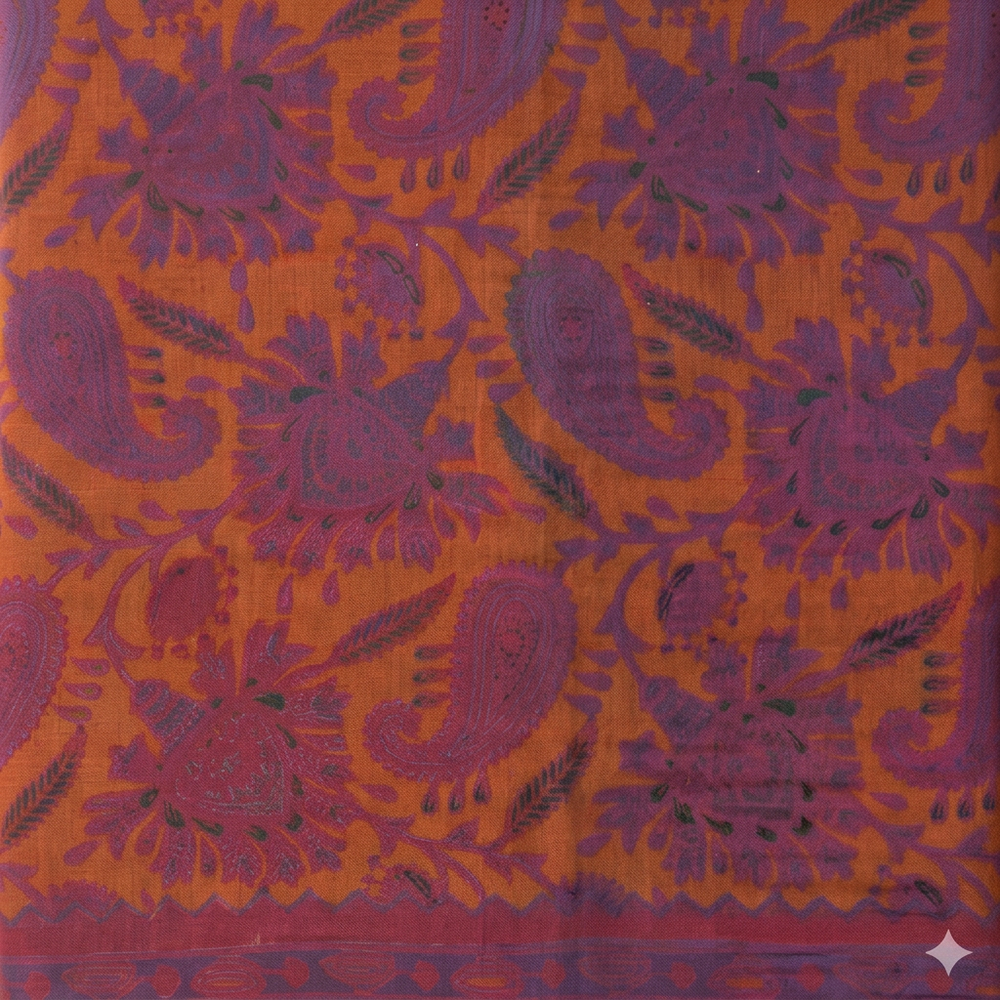Close-up of purple paisley and floral motifs on mustard-yellow cotton dance saree