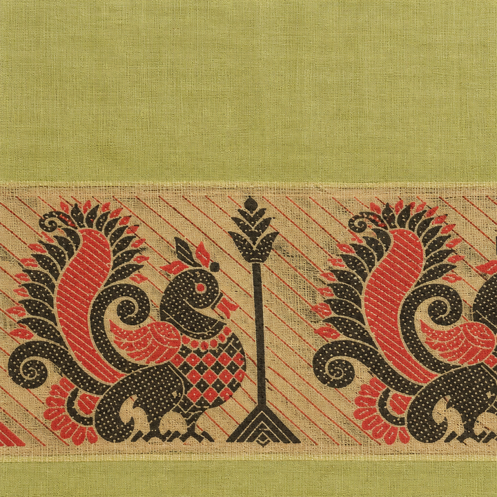 Close-up of coral red and black peacock motif on beige saree border