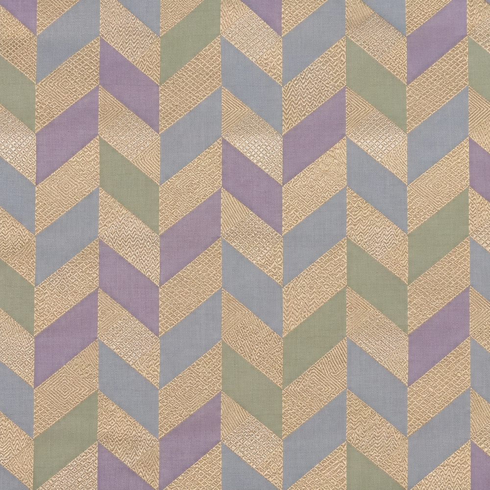 Pastel Banarasi saree body close-up showing lavender sage and pale blue chevrons