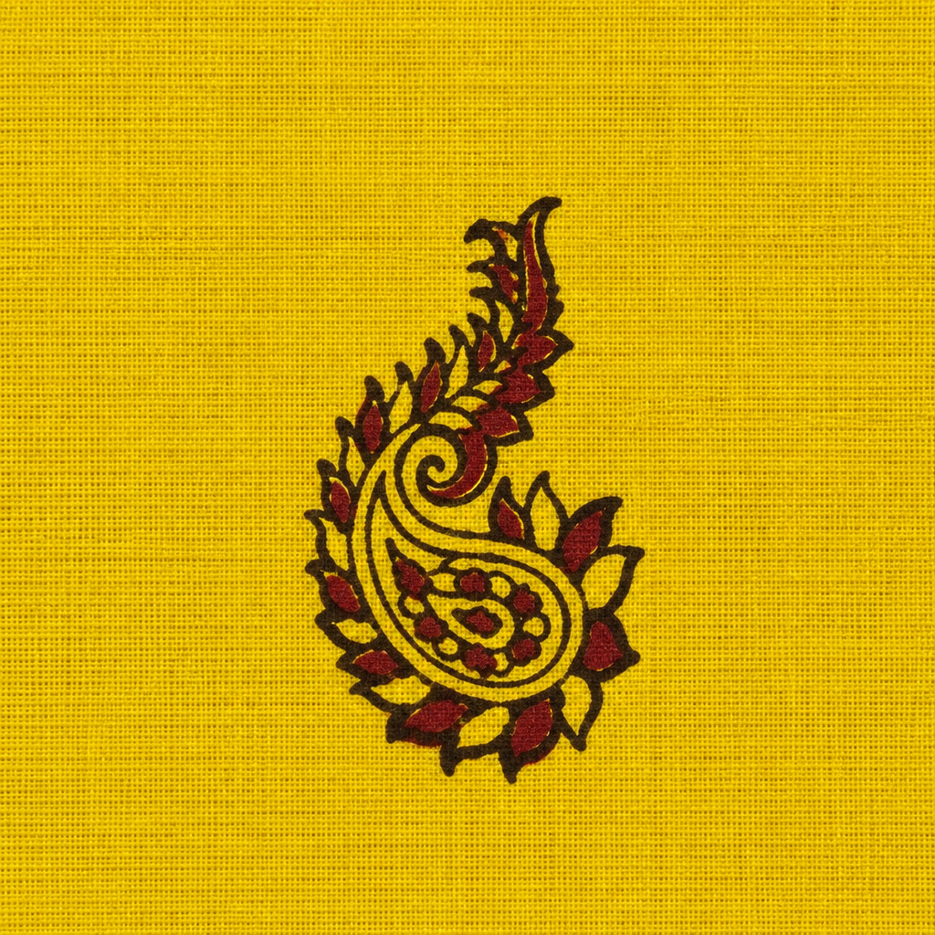 Close-up of maroon paisley buta on yellow cotton saree