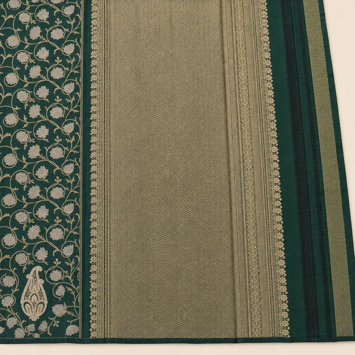 Green saree gold-toned pallu zigzag texture and ornate border close-up