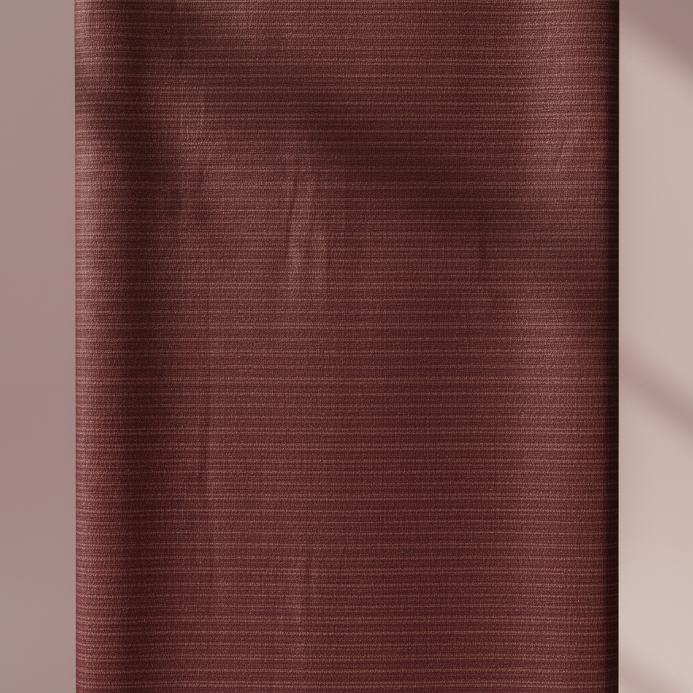 Close-up of the burgundy, wine, and plum cotton saree showing its fine horizontal striated weave and subtle tonal bands