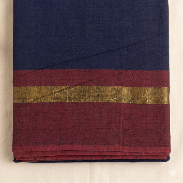 Maroon border with gold-toned stripe on navy blue cotton dance saree, close-up
