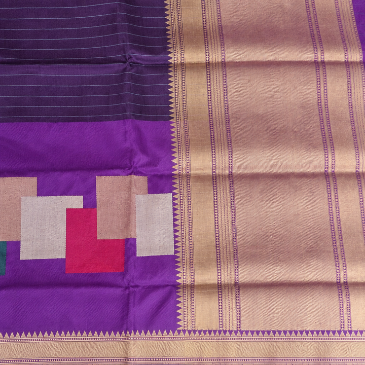 Broad gold-toned panel with patterned bands and triangular edging beside purple geometric motifs and fine stripes