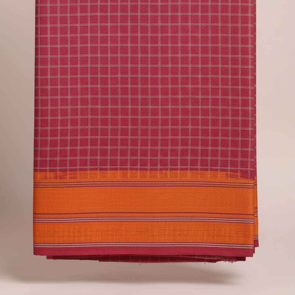Close-up of the raspberry checked saree with its vivid orange border, thin purple-pink-gold stripes, and deep rose lower edge