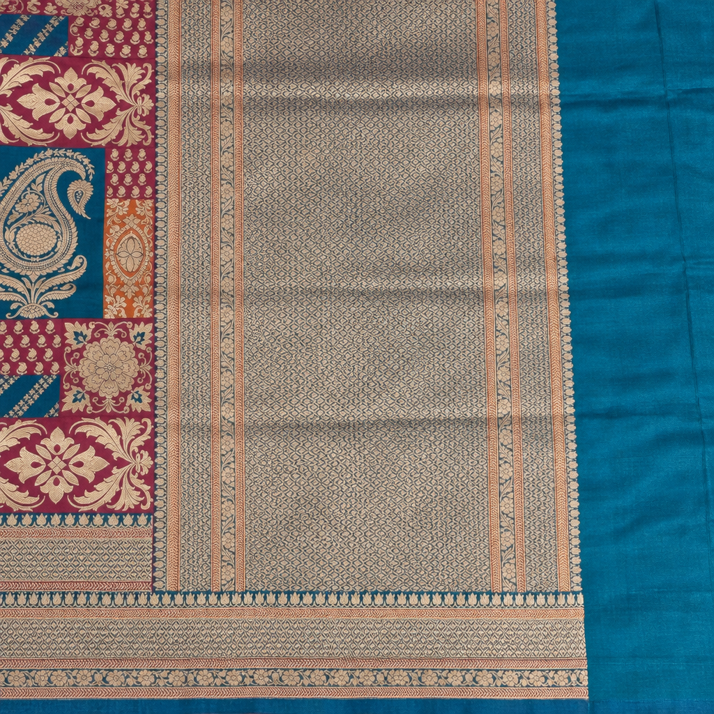 Turquoise saree finely patterned pallu and ornamental border detail