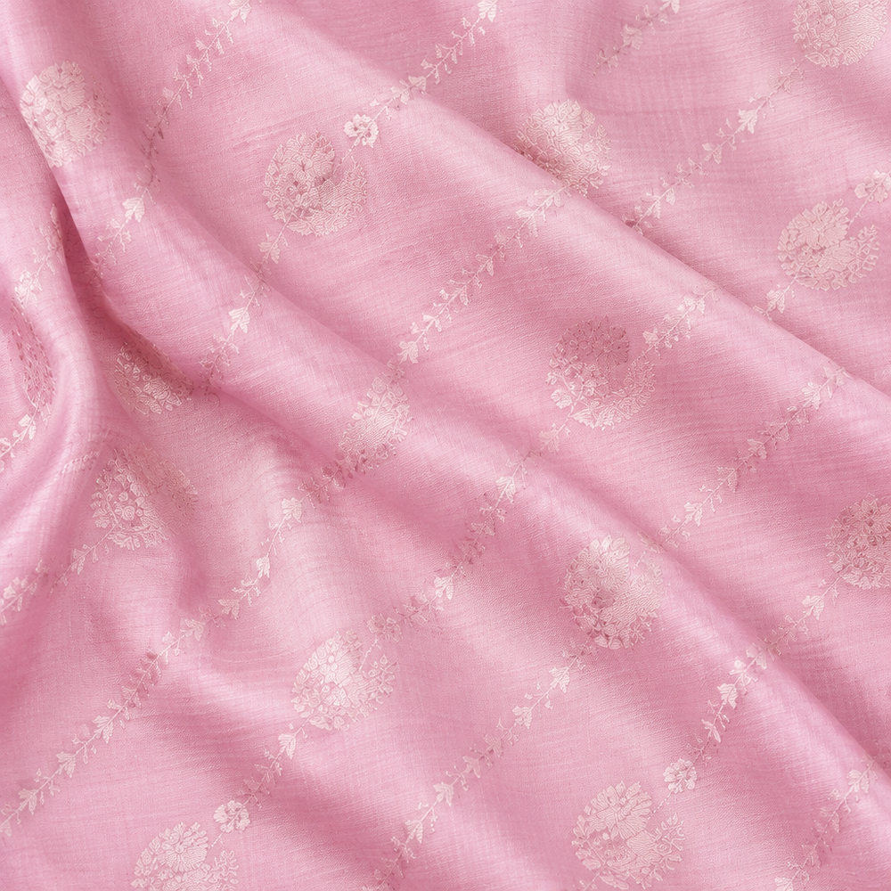Close-up of the baby pink pure Tussar silk saree body with self-tone butti motifs