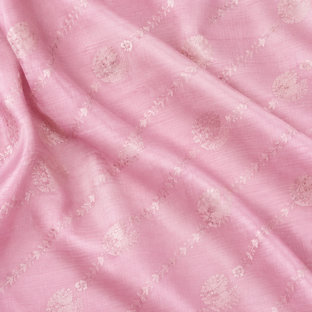 Close-up of the baby pink pure Tussar silk saree body with self-tone butti motifs