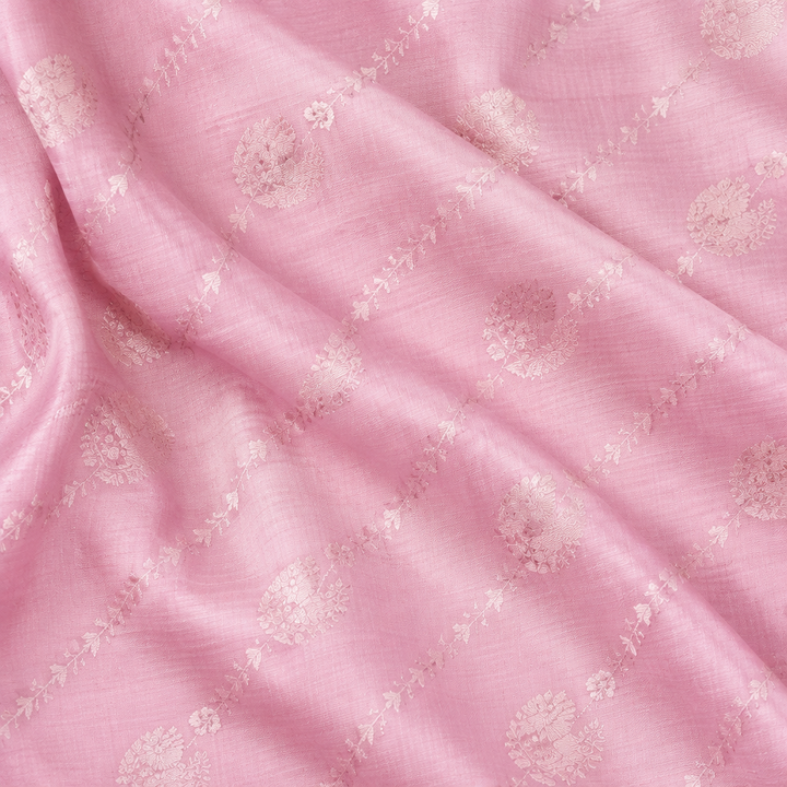 Close-up of the baby pink pure Tussar silk saree body with self-tone butti motifs