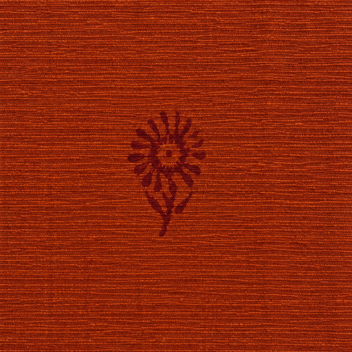 Close-up of maroon buta on rust orange textured cotton saree body