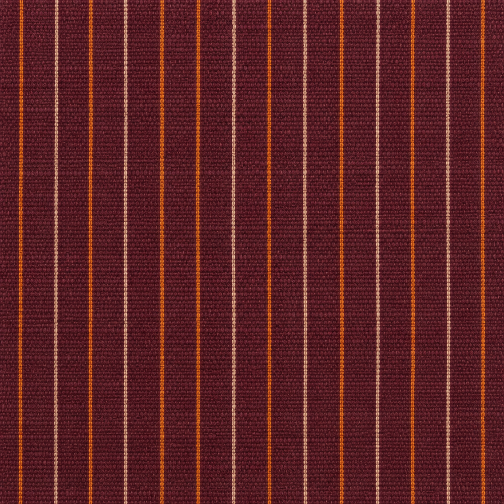 Close-up of cream and orange pinstripes on plum cotton saree