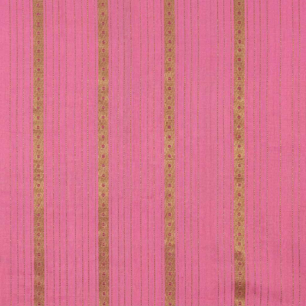 Close-up of the light pink saree body with fine gold pinstripes and rows of small gold dots