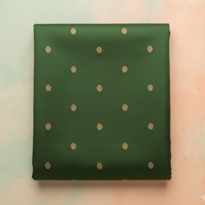 Green pure silk saree body with gold zari motifs close-up