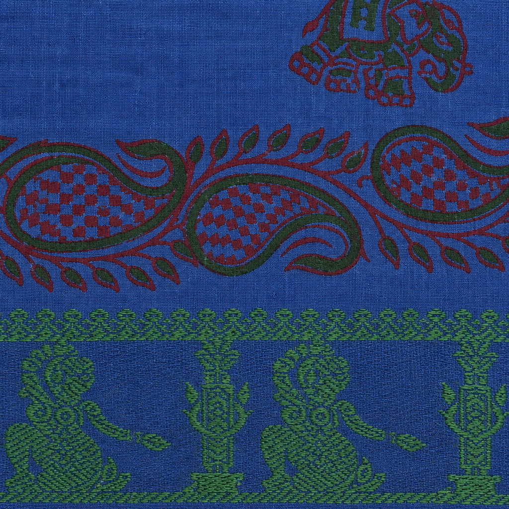 Close-up of paisley vine band and green border on royal blue cotton saree