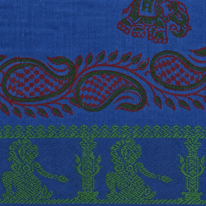 Close-up of paisley vine band and green border on royal blue cotton saree