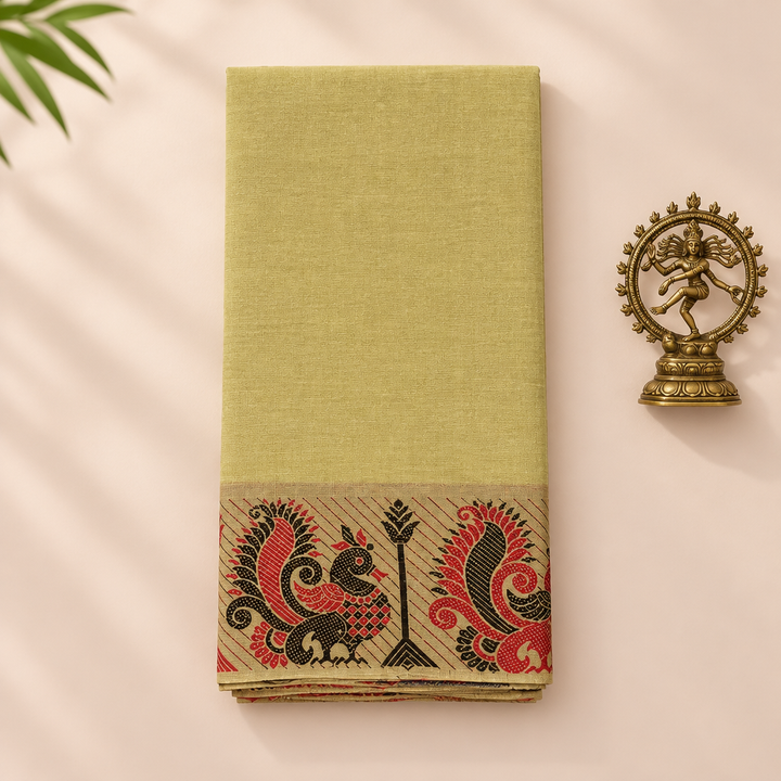 Pista green cotton dance saree with peacock border, folded flat lay with Nataraja prop