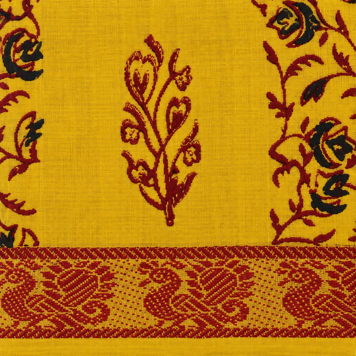 Close-up of maroon woven bird motif border on yellow cotton saree