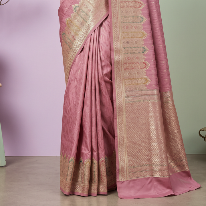 Close-up of the rose pink Banarasi silk saree beige-gold woven border and scalloped pallu