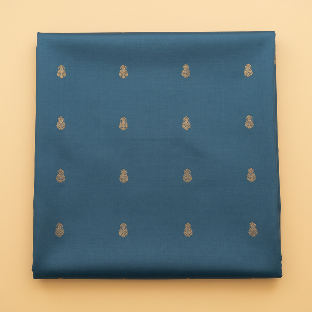 Blue pure silk saree body with gold zari motifs close-up